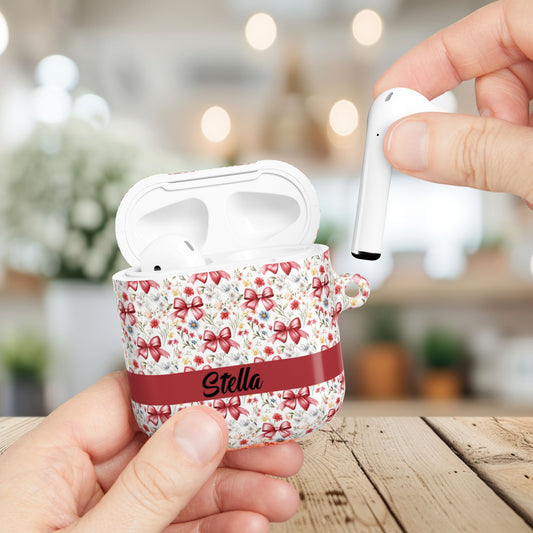 Personalized Rosette Coquette Floral AirPods Pro Gen 1, 2 and Airpods Gen 1, 2, 3, 4 Case — Red Bow Pattern with Custom Name Text.