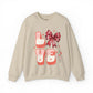 LOVE Coquette Unisex Heavy Gildan Blend™ Crewneck Sweatshirt.