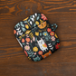 Whimsical Feline Garden AirPod Cases (AOP)